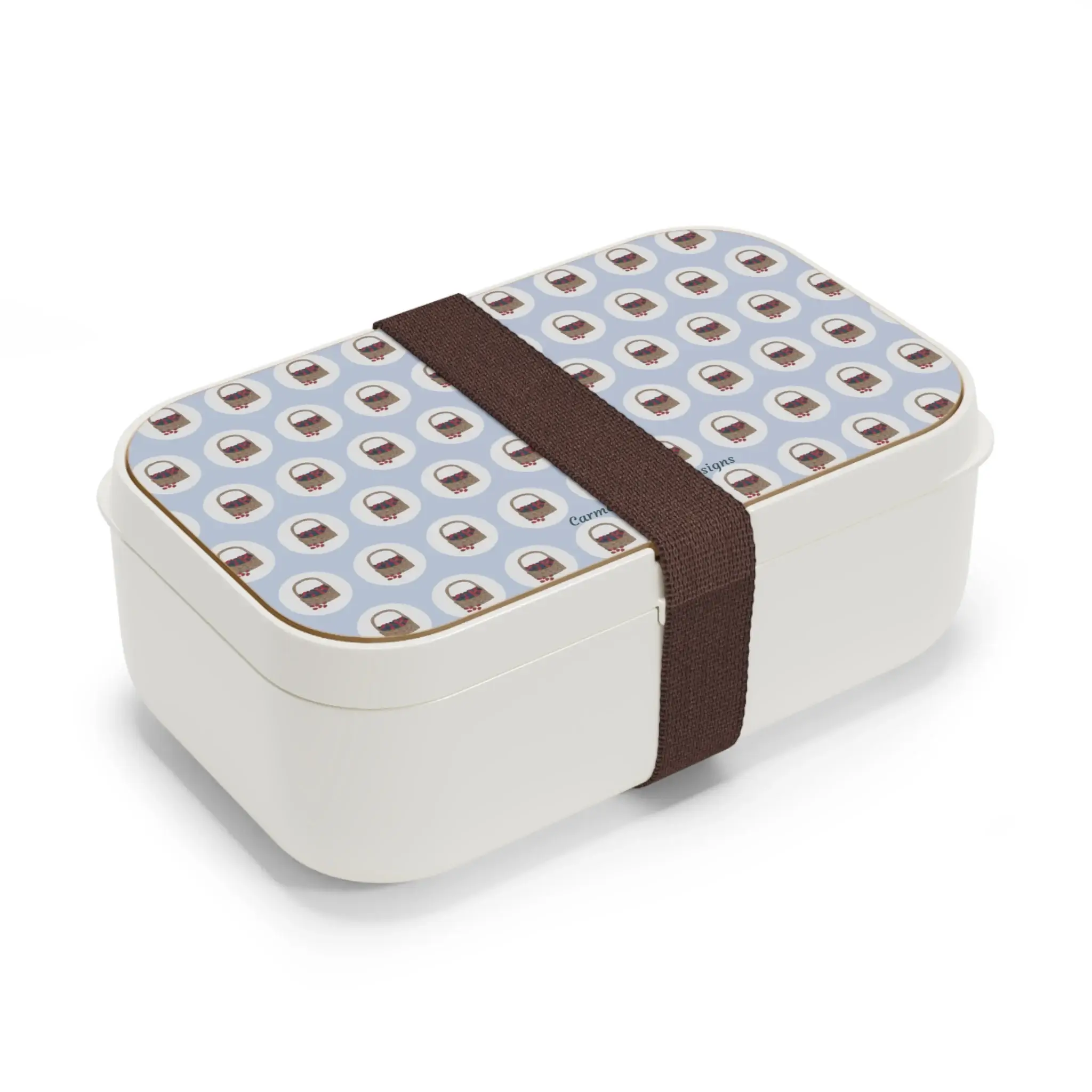 Basket of Berries bento lunchbox with berry pattern on light blue background and wooden lid.