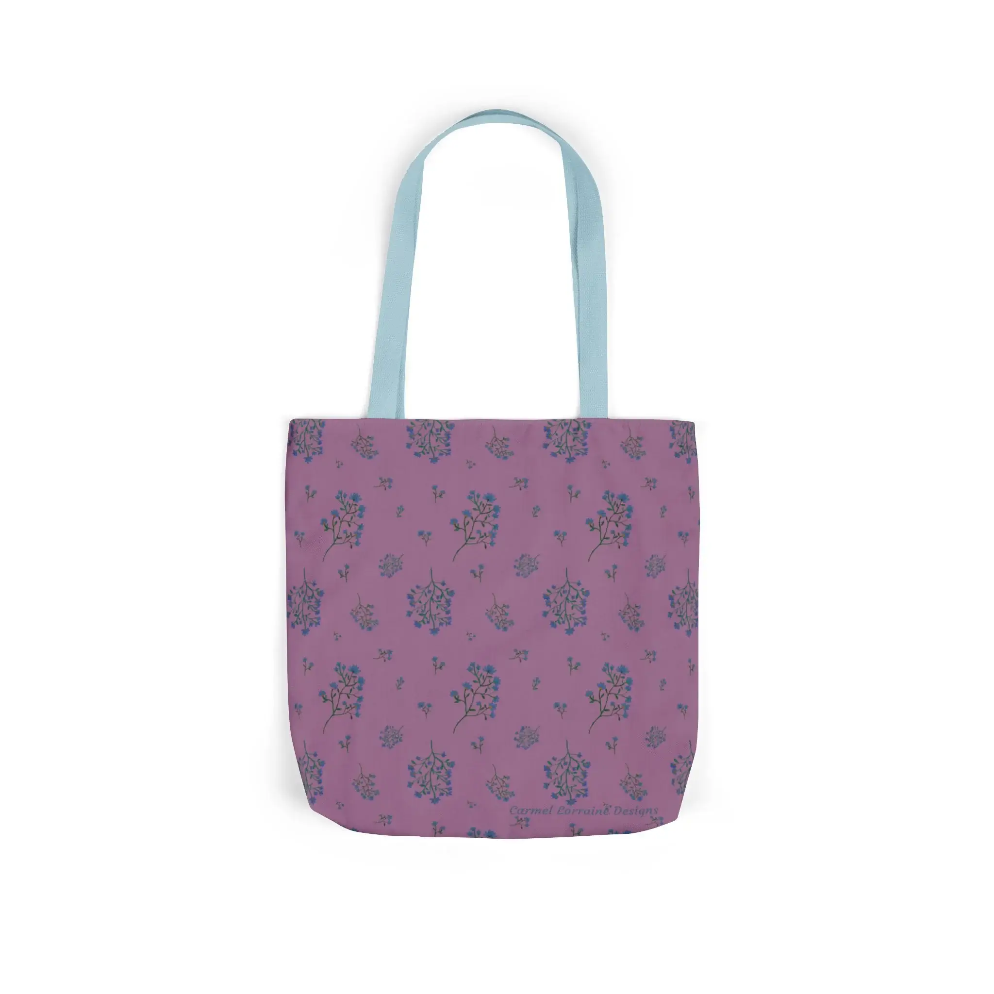 Woodland Lavender Breeze tote bag with floral pattern and light blue straps.