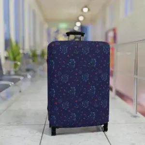Close-up of a navy blue floral luggage cover from the Woodland Bloom collection, snugly fitted on a suitcase.