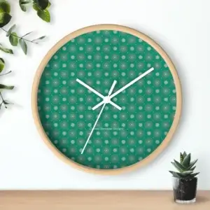 Floral mandala wall clock with white hands, no numbers, and a light wood base featuring a jade green background.