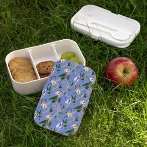 Blue Finch Canopy bento lunchbox with finches on taupe branches, soft shadows, and wooden lid